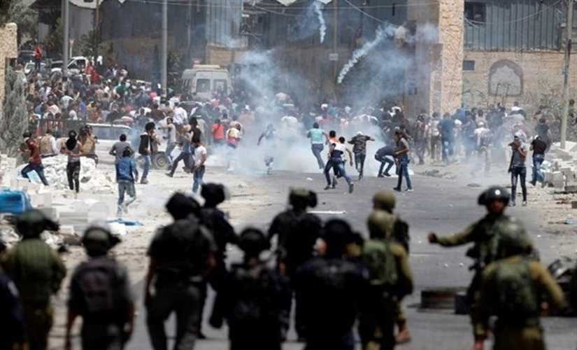 اصابة فلسطينيين باختناق