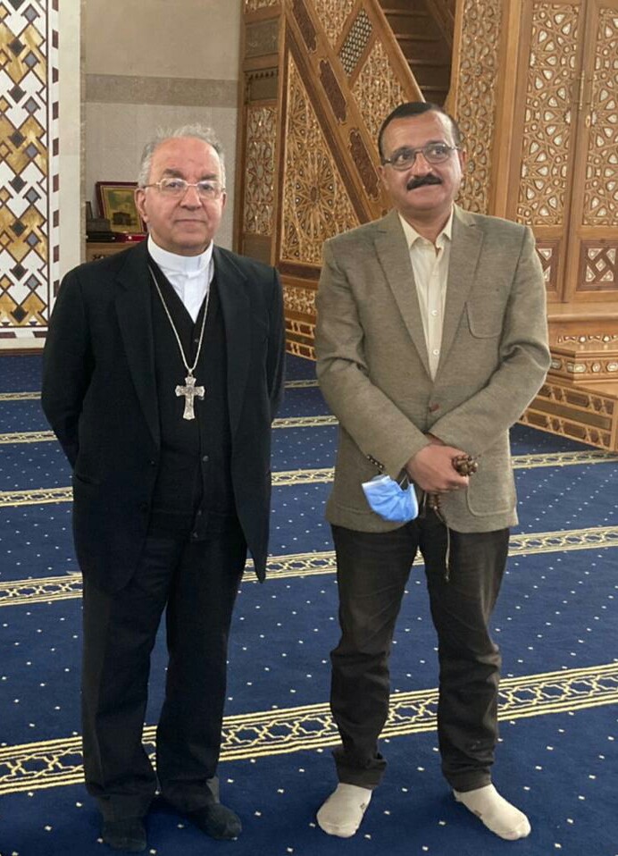 المطران جورج شيحان يزور مسجد الفتاح العليم