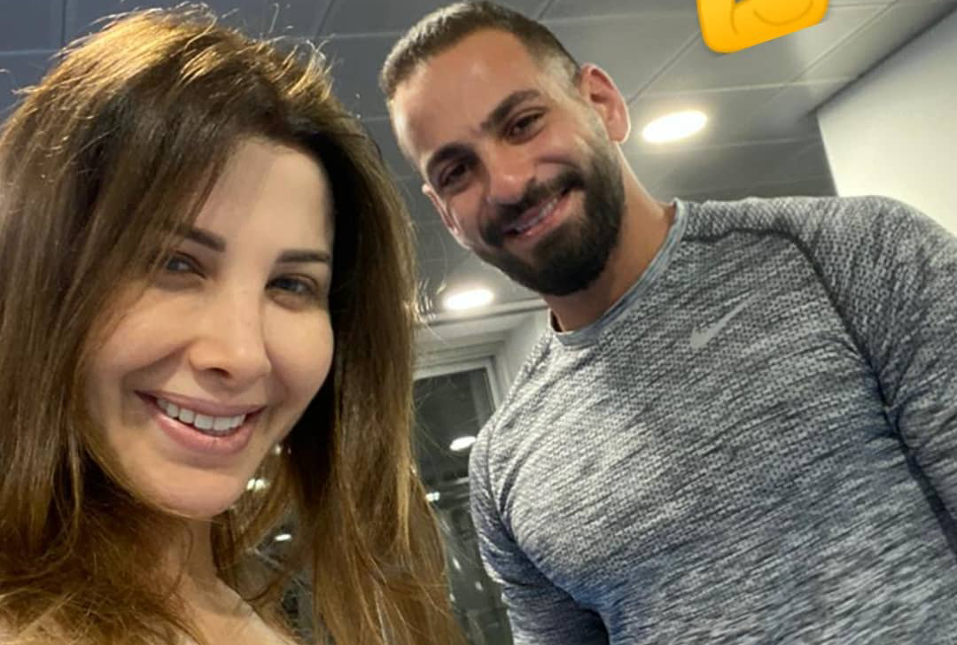 نانسي عجرم مع مدرب الجيم