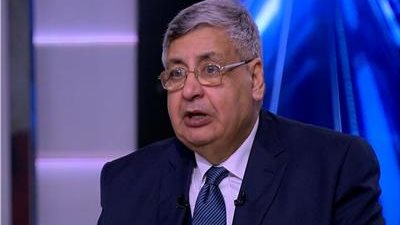 الدكتور محمد عوض تاج الدين مستشار الرئيس