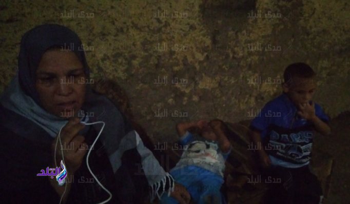 أميمه خلف الله والدة الطفلين المصابان بضمور المخ