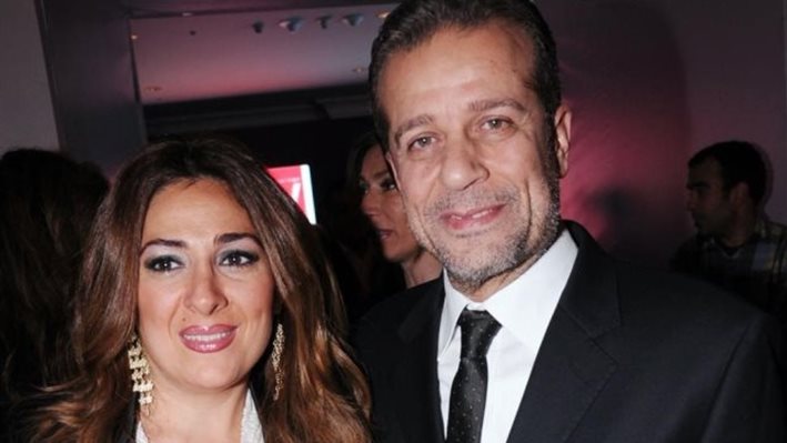شريف منير وزوجته 
