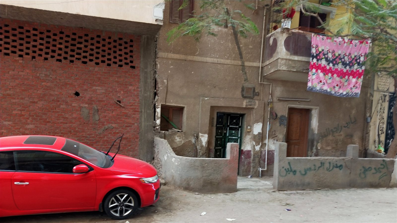 منزل الزوجين القتيلين بحى باغوص بالفيوم