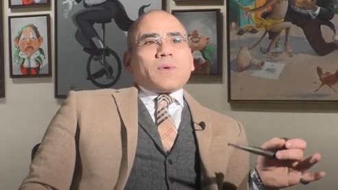 الأستاذ عمرو فهمي، رسام الكاريكاتير الكبير