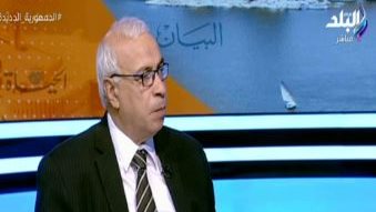 الكاتب الصحفي علي حسن