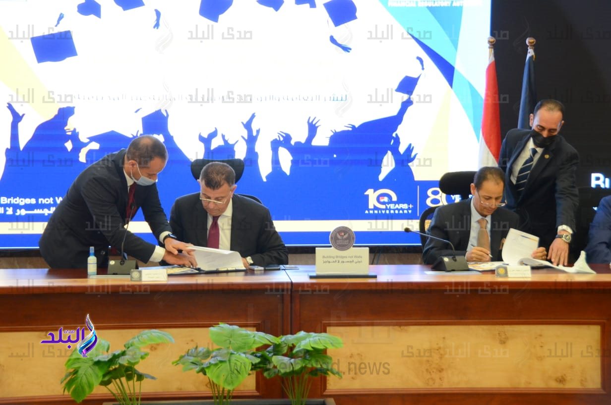 جانب من بروتوكول التعاون لرفع مستويات الوعي المالي