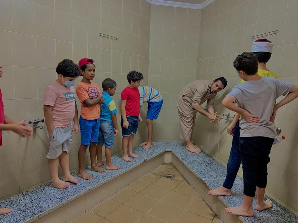 تدريب الأطفال على كيفية الوضوء