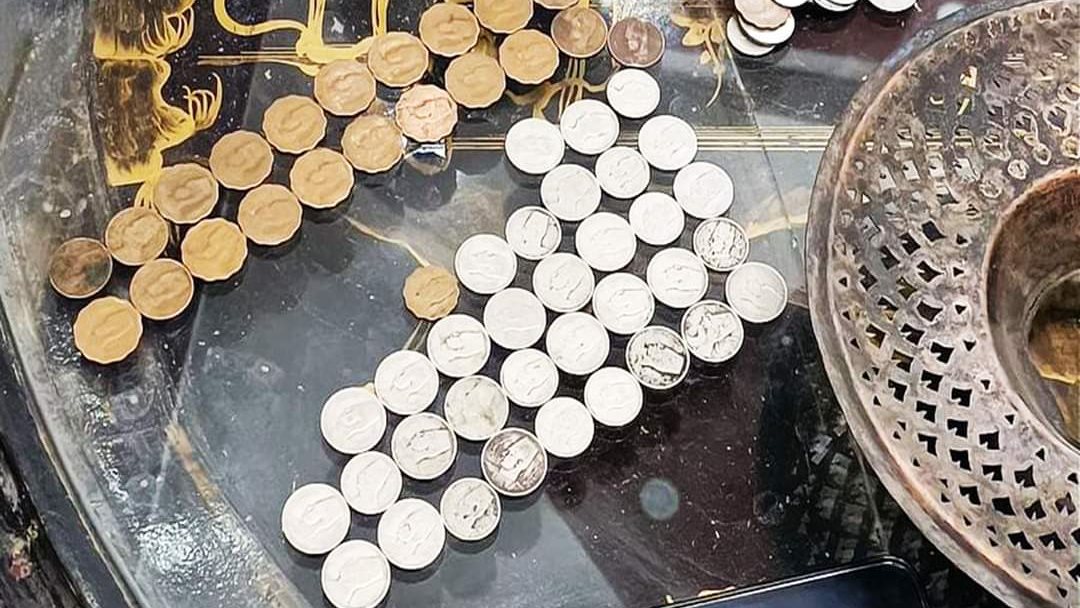 ضبط قطع يشتبه في أثريتها بالمنيا 