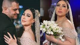 الفنانة بوسي وزوجها 