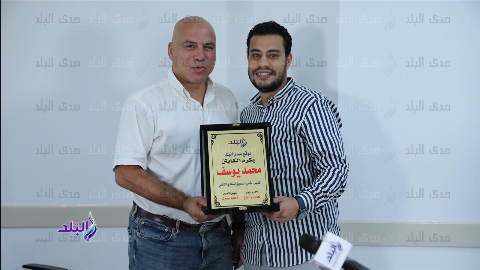 محمد يوسف و الصحفي حسام الحارتي  