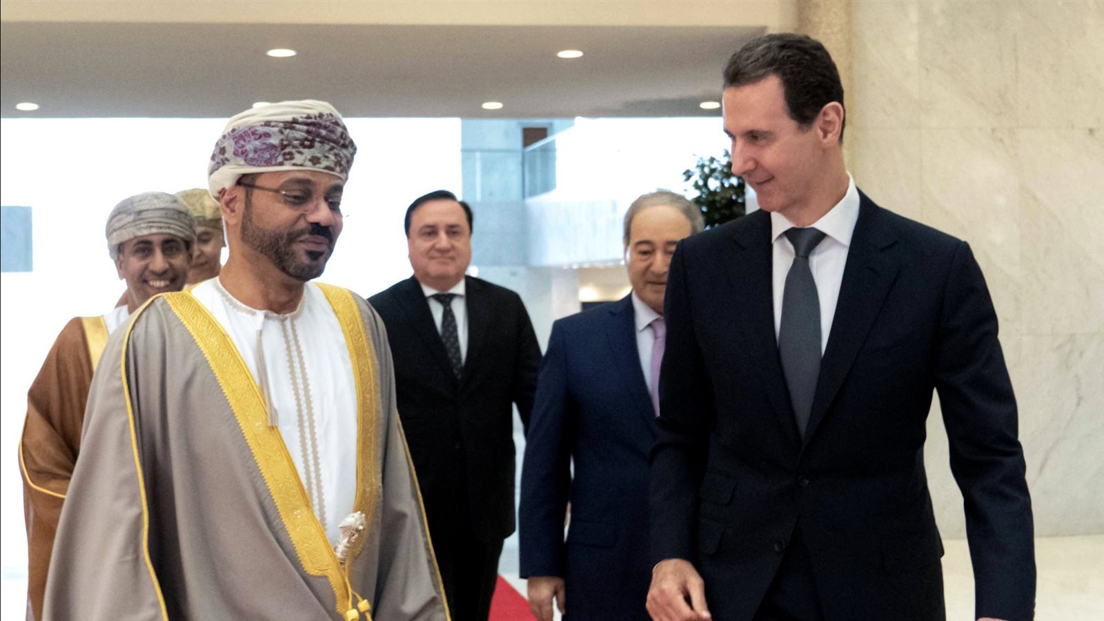 بشار الأسد مع وزير الخارجية العماني