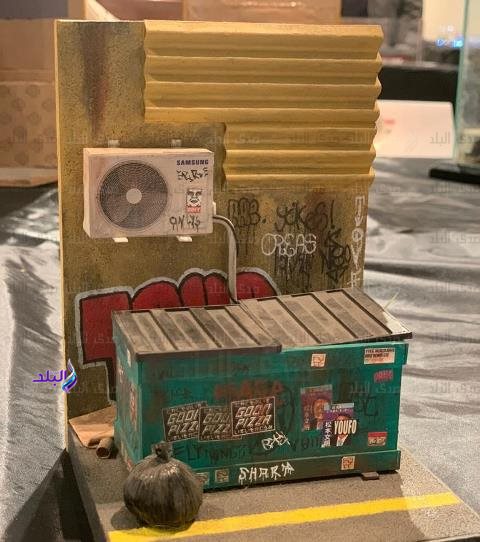 تكريم طالب من جامعة بدر فى معرض مصر لفنون النماذج المصغره