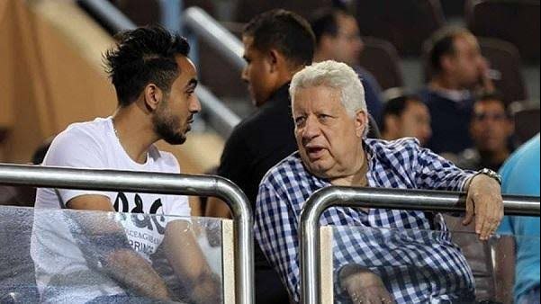 مرتضى منصور رئيس نادي الزمالك وكهربا لاعب الأهلي 