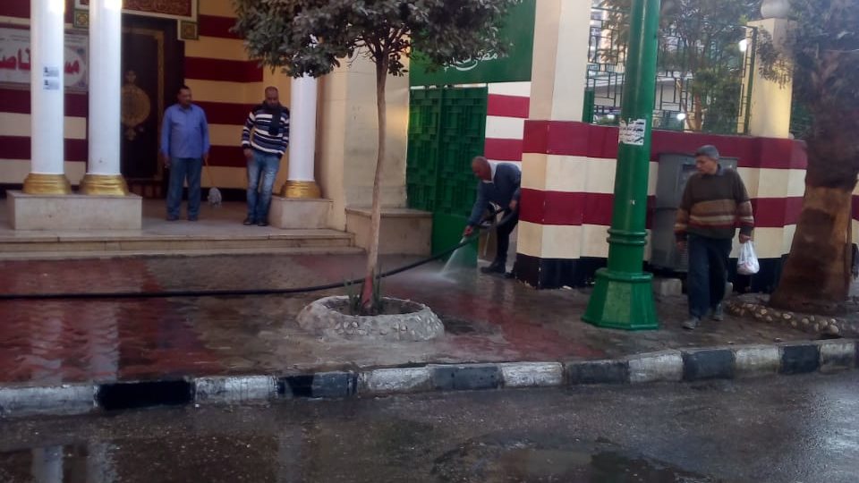 أعمال غسيل ميدان الشهيد أحمد جلال بأسيوط 