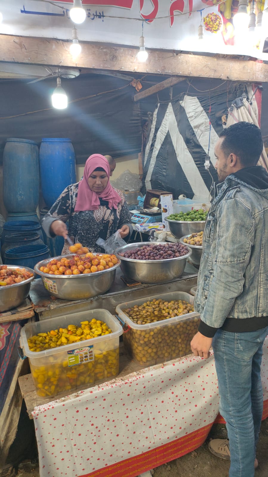 "ام رائد " ست بميت رجل اشهر يائعة طرشي في معارض أهلا رمضان 