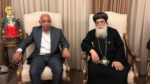 رئيس اتحاد العمال ومطران 6 أكتوبر 