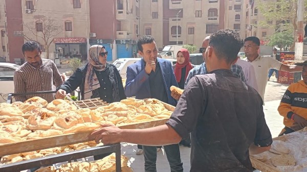جانب من حملات حي الكوثر بسوهاج