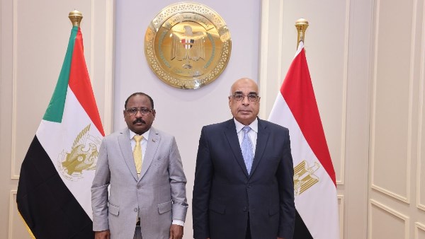 وزير العدل ونظيرة السودانى