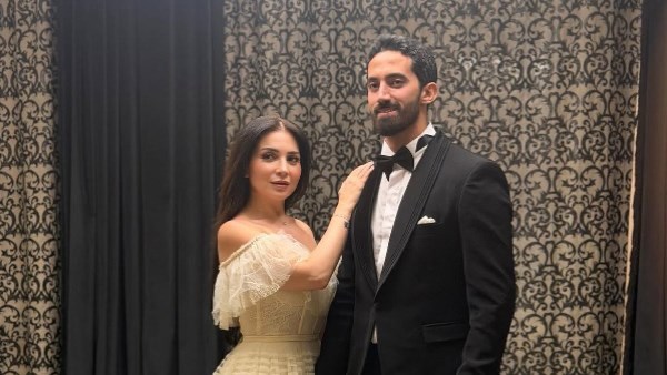 مي عز الدين وزوجها