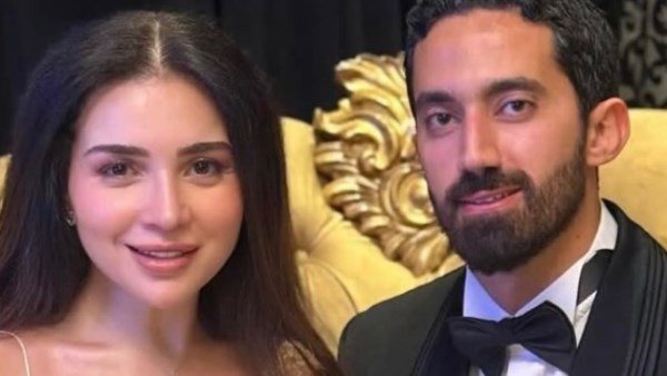 مي عز الدين وزوجها