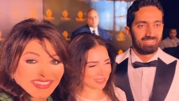 مي عز الدين وزوجها