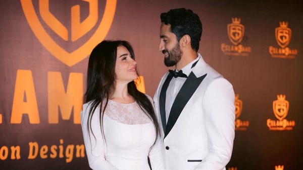 مي عز الدين و زوجها