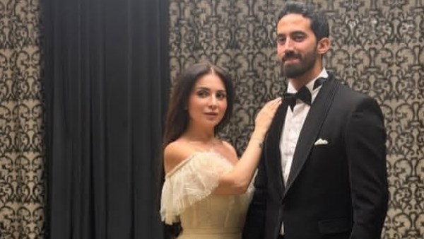 مي عز الدين و زوجها 