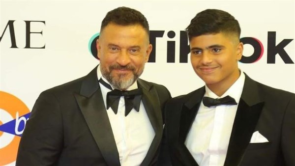  آدم مع والده ماجد المصري 