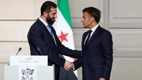 الرئيس الفرنسي ونظيره السوري