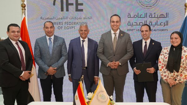 جانب من توقيع البروتوكول 