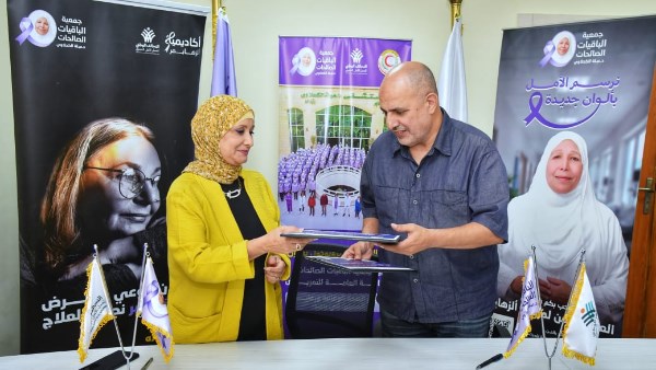 جانب من توقيع البروتوكول 