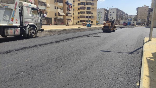 استمرار أعمال الرصف ورفع كفاءة منطقة علي بن أبي طالب بزهور بورسعيد