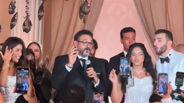 الفنان أكرم حسني و الفنانة أيتن عامر 