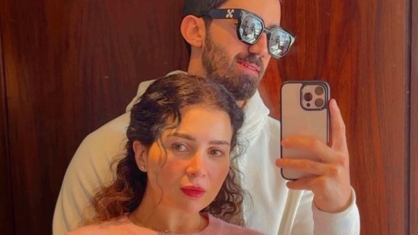 مي عز الدين وزوجها