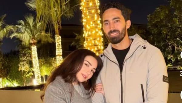 مي عز الدين وزوجها