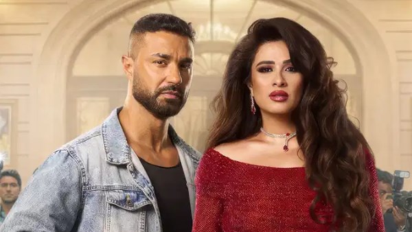 ياسمين عبد العزيز وكريم فهمي 