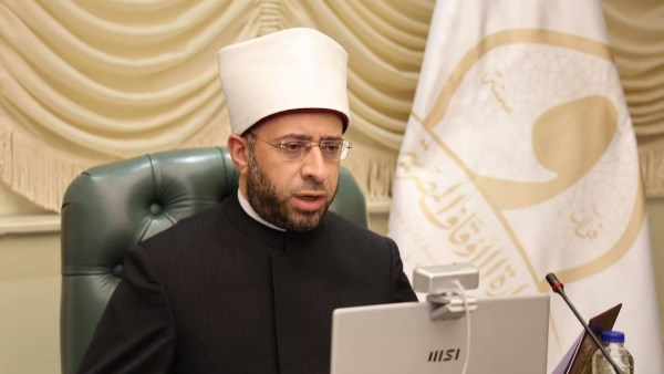 وزير الأوقاف خلال مشاركته بالمؤتمر عبر الاتصال المرئي 