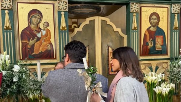 دانيلا رحمة وناصيف زيتون يحتفلان مع طفلهما إلياس فى الكنيسة.. شاهد