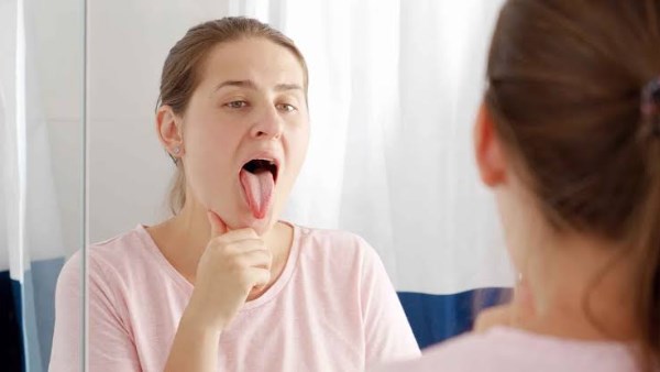 ما علاقة ارتفاع الكوليسترول بصحة الفم؟