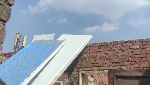  إزالة جمالون مخالف أعلى سطح عقار في العجوزة